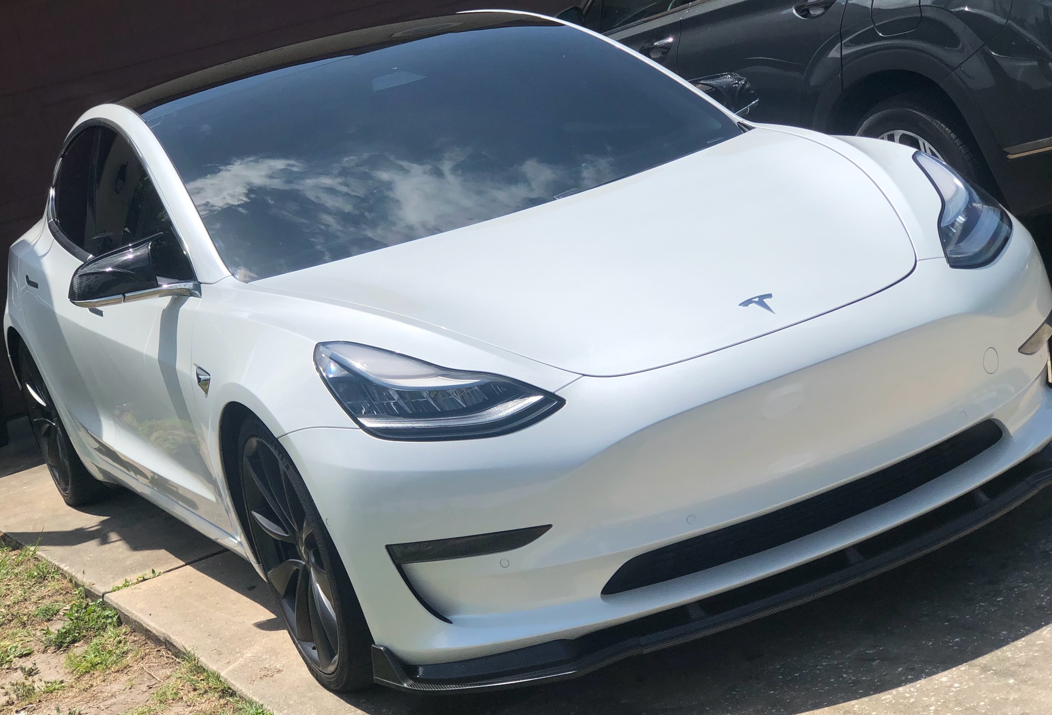 Telsa ceramic coating with top to bottom detail.